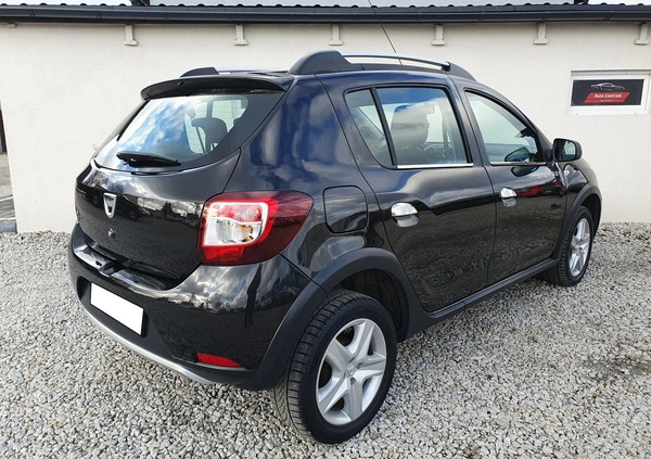 Dacia Sandero Stepway cena 26700 przebieg: 140000, rok produkcji 2013 z Nowy Tomyśl małe 232